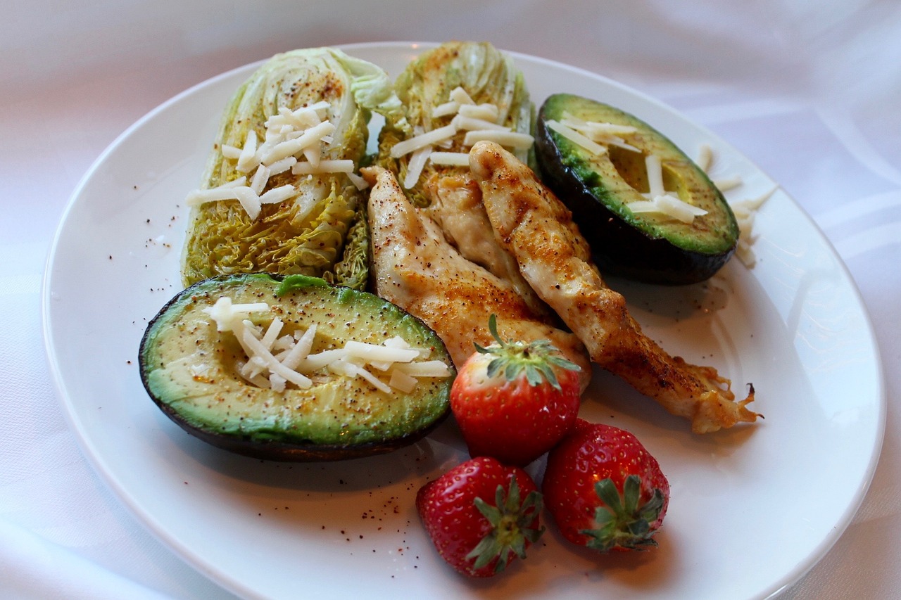 Chicken Salad with Grapes, Avocado, and Almonds over Spinach