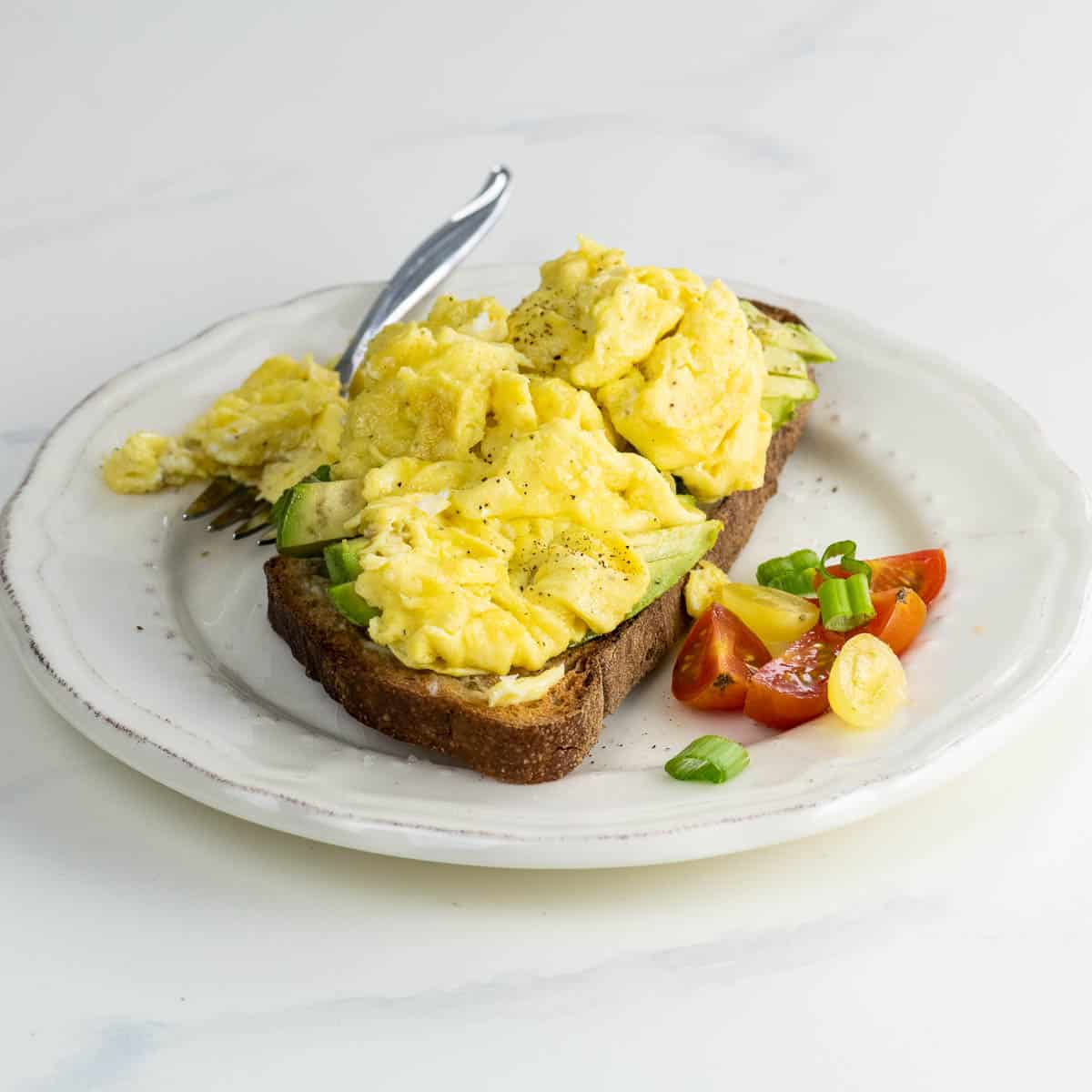 Avocado Toast on Whole Grain Bread with Scrambled Eggs | Whole Living Eat Well